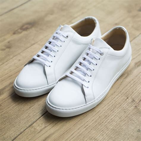 minimal white leather sneakers.